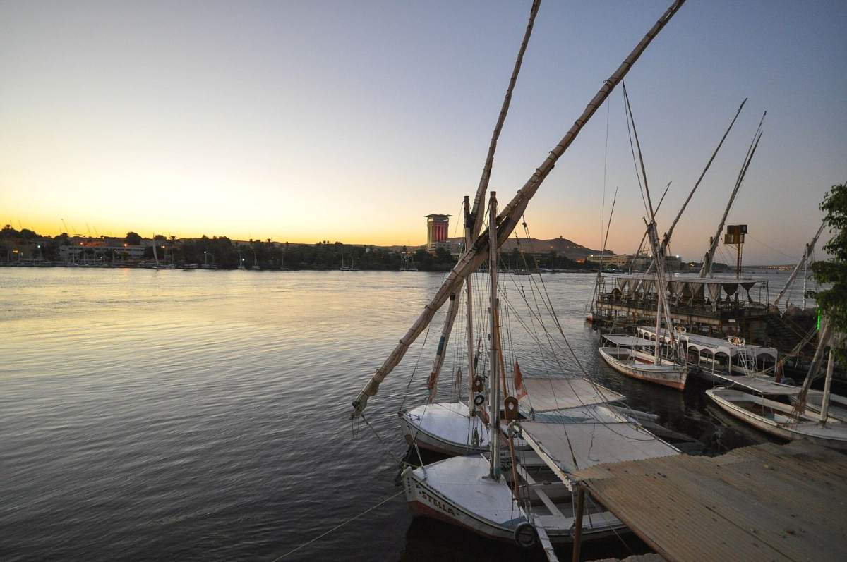 A felucca sailing on the Nile at dusk