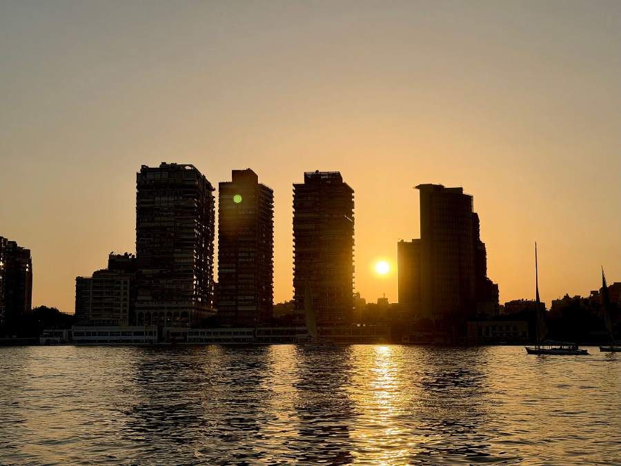 The sun setting over the Nile and the Cairo skyline